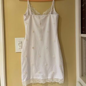 White embroidered flowers dress